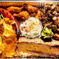 Family Bbq Meat Feast · NO SUBSTITUTIONS: **1 Lb each: Brisket OR Burnt Ends, Pulled Pork & Smoked Kielbasa **12 Win...