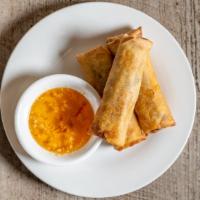 #A2 Egg Rolls (3Pcs) · Three piece egg rolls consisting of eggs, white onion, carrots, ground pork, taro, with swee...