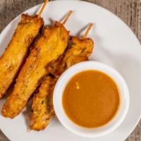 #A5 Satay Chicken (3Pcs) · Marinated chicken on a stick served with peanut sauce.