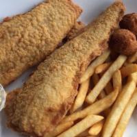 Catfish Fillet · Two grilled or breaded fillets served with tartar sauce and lemon on the side.