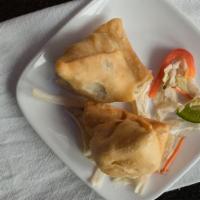 Samosa (2 Pieces) · Spicy turnovers stuffed with potatoes and green peas.