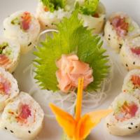 Crazy · Salmon, tuna, yellowtail, crabstick, lettuce, cucumber, masago, soy paper.