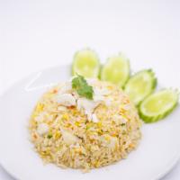 Crab Fried Rice · Stir-fried rice with crab meat, egg, carrot, onion, pea, scallion.