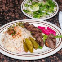 Shish Kabob Beef Plate · Contains nuts. Traditionally marinated chunks of lamb or beef, charbroiled to a tender perfe...