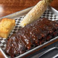 St Louis Style Ribs · Smoky, meaty, and lightly sauced choice of 2 sides.