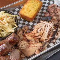 Meet Our Meats Platter · 1/4 Pound each of Beef Brisket, Smoked Pork, BBQ Chicken, and Smoked Beef Sausage with choic...