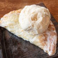 Blueberry Hand Pie · Fresh baked hand pie with vanilla bean ice cream.
