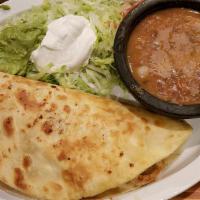 Quesadilla Grande · A Large Flour Tortilla filled with Grilled Chicken and Cheese, served with Lettuce, Pico de ...