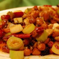 Kung Pao Delight · Spicy. Chicken and shrimp stir fried with diced vegetables and peanuts in spicy brown sauce.