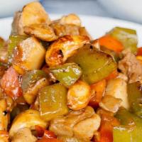 Cashew Chicken · Spicy. Breast meat of chicken, stir-fried with cashew and diced vegetables in a spicy sauce.