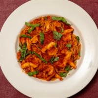 Shrimp Fra Diavolo · Shrimp sauteed in a spicy marinara sauce and served over pasta. Served with rice.