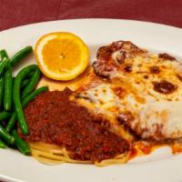 Chicken Parmigiana · Carved boneless breasts pounded flat, breaded with Italian bread crumbs, then baked in a lig...