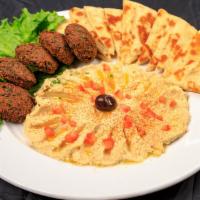 Create Your Own Duo  · Hummus, falafel combination, served with side of tzatziki sauce.
Dolma and falafel combinati...