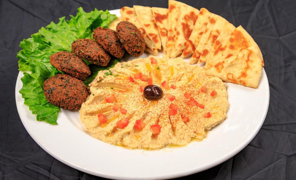 Create Your Own Duo  · Hummus, falafel combination, served with side of tzatziki sauce.
Dolma and falafel combination, served with a side of tzatziki sauce.
Classic hummus and dolmas combination.