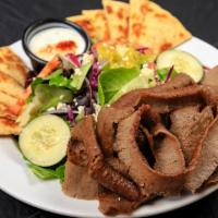 Gyros Salad  · Generous portion of grilled gyros meat with fresh greens, tomato, cucumber, unpitted calamat...