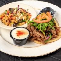 Classic Gyros · A generous portion of savory beef and lamb with lettuce, tomatoes and red onions.
