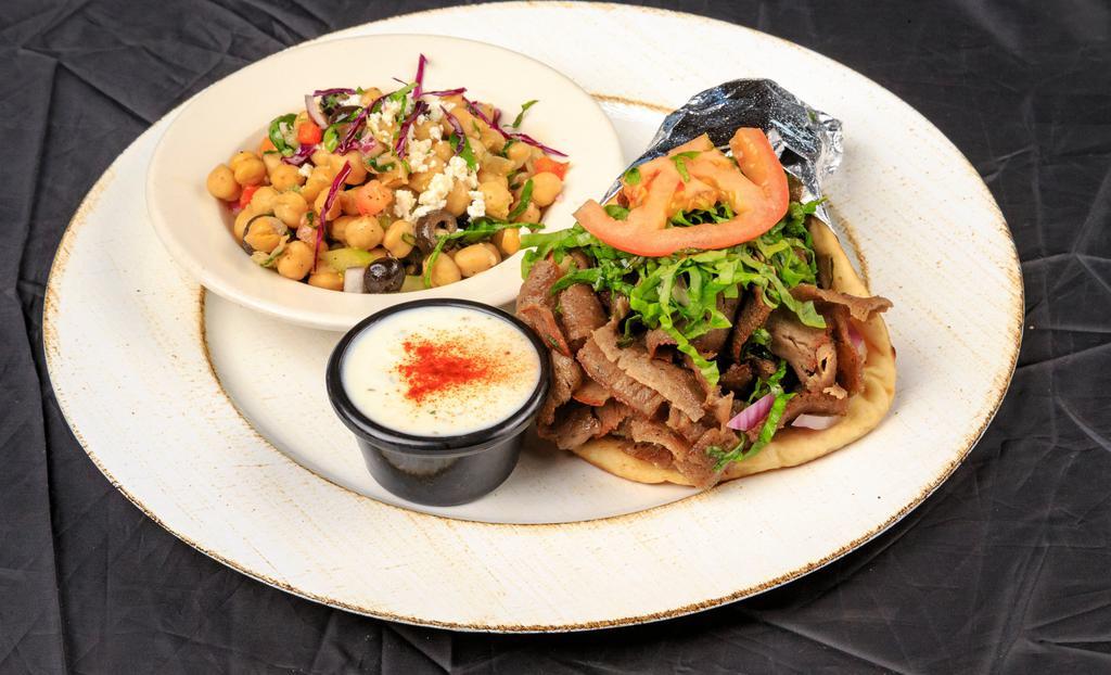 Classic Gyros · A generous portion of savory beef and lamb with lettuce, tomatoes and red onions.