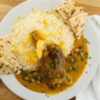 Persian Saffron Lamb Shank · This unique saffron flavored new Zealand lamb shank served with, garbanzo beans, over steame...