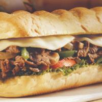 Philly Cheese Steak Combo · Comes with Grilled Onions, Grilled Green Peppers, Mayo & Cheese. Served With Fries And Can O...