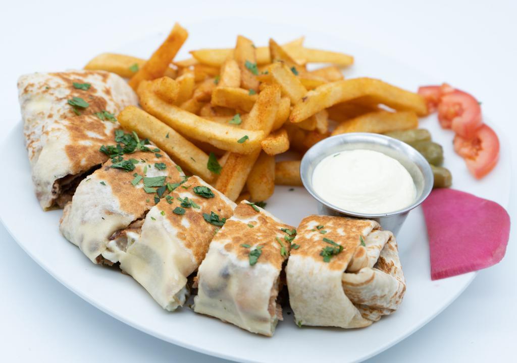 Chicken Shawarma With Fries · Rotisserie-roasted sliced chicken with our housemade seasoning, garlic sauce pickles, and potato. With fries on the side.