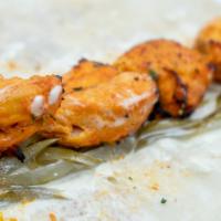 Chicken Shish Kabob · Marinated tender chicken skewer house seasoning pickles, garlic sauce.