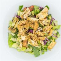 Fattoush Salad · Mixed greens, pita, chips, cucumbers, tomato, onion, parsley tossed in lemon sumac, and herb...