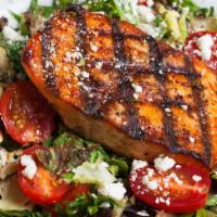Grilled Salmon Salad · Grilled salmon, field greens, grape tomatoes, roasted brussels sprouts, feta. Dijon balsamic...