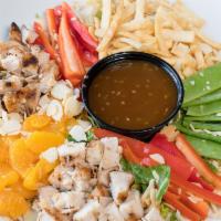 Asian Chicken Salad · Cabbage, romaine, chicken, red bell pepper, mandarin oranges, snow peas, toasted almonds, wo...