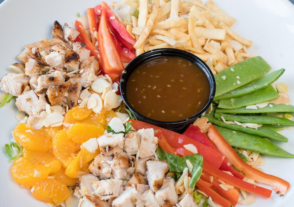 Asian Chicken Salad · Cabbage, romaine, chicken, red bell pepper, mandarin oranges, snow peas, toasted almonds, wontons. Sesame ginger dressing.