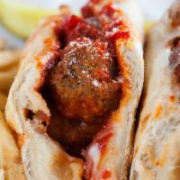 Italian Meatball · Italian meatballs, onion, mozzarella, marinara on an 8
