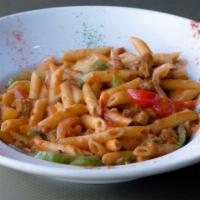 Voodoo Pasta · Chicken, Andouille sausage, shrimp, peppers, onions, spicy tomato cream sauce.