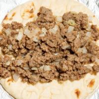 Large Gyro · Your choice of lamb, beef, or chicken. Thinly chopped gyro meat placed on pita, topped with ...