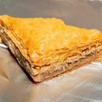 Homemade Baklava · Layers of phyllo dough filled with walnuts and honey.
