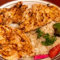 Deboned Chicken · Most popular. Marinated in garlic sauce and char broiled. Served with choice of side and sou...