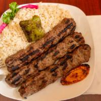 Shish Kafta · Choice of ground lamb or chicken mixed with fresh parsley and onions, served with tahini sau...