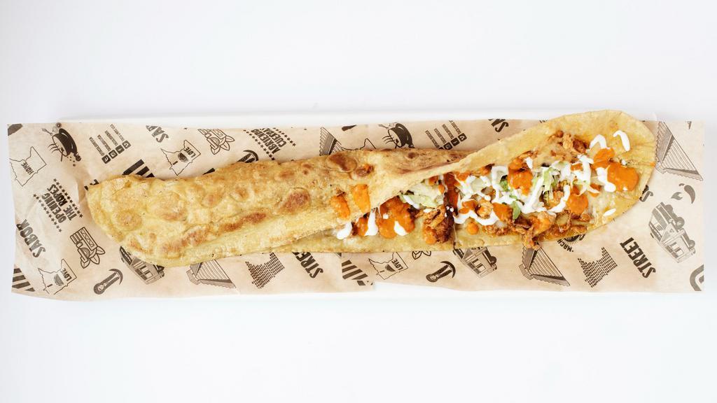 Machete® · An 18” machete sized masa tortilla filled with Oaxaca cheese, lettuce, sour cream & your choice of meat.