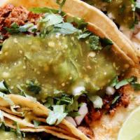 Kids' Street Taco · Corn tortilla, cilantro, onion, & choice of meat.