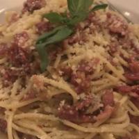 Spaghetti Carbonara · spaghetti pasta infused with a light smoked pancetta, proscuitto and capicola. your choice o...