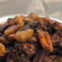 Sunday Jerk Pot Roast · Only at Yaso is Ja'Net's original Jerk Pot Roast.  Beef Chuck roast, carrots, Irish potato a...