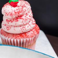 Strawberry Shortcake · Strawberry cake baked with fresh strawberries, topped with a swirl of strawberry buttercream...