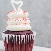 Scarlett’S Red Velvet · Red velvet cake with a vanilla filling, topped with cream cheese frosting, a white chocolate...