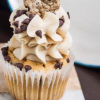 Chocolate Chip Cookie Dough · Chocolate chip cookie cake topped with cookie dough frosting, chocolate chips and finished w...