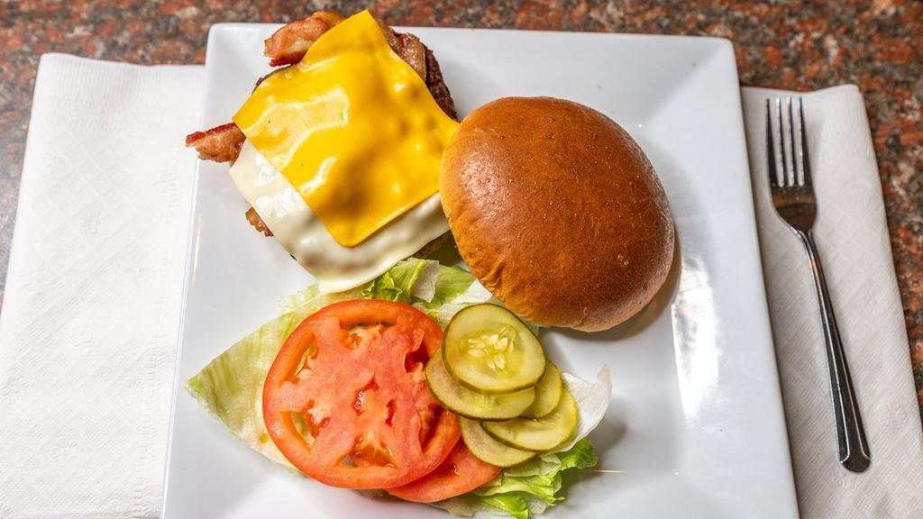 Special Burger · 1/3 lb. choice ground beef, bacon, Swiss cheese, lettuce, tomato, pickle, and American cheese.