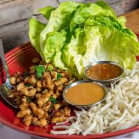 Lettuce Wraps · Vegetarian. Choice of sweet Thai chicken or tofu & mushrooms, served with rich & juicy bibb ...