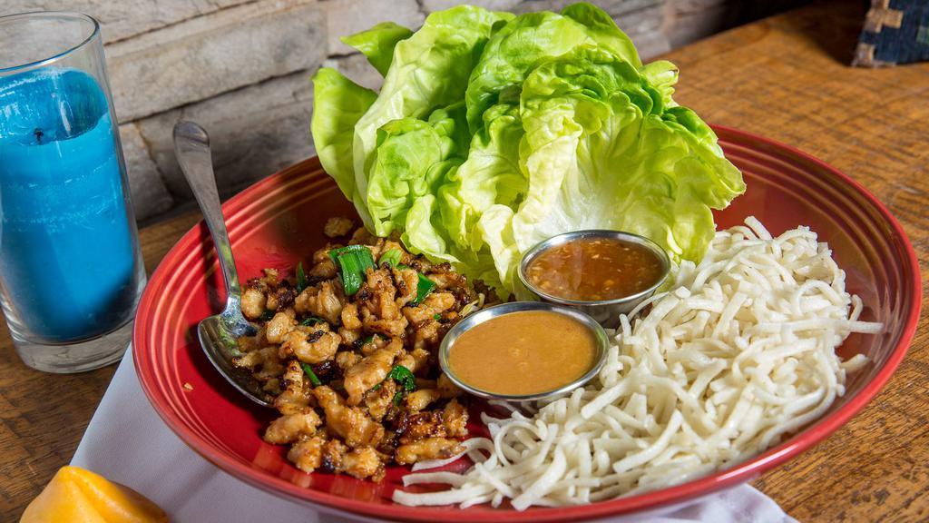 Lettuce Wraps · Vegetarian. Choice of sweet Thai chicken or tofu & mushrooms, served with rich & juicy bibb lettuce, green onions, rice noodles, house-made sweet chili & peanut sauces.