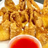 Crab Rangoon (5) · Crispy pastry shell filled with imitation crab meat and cream cheese and deep fried until go...
