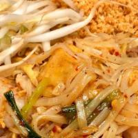Pad Thai Curry · Stir fried rice noodles with eggs, bean sprouts, red peppers and green onions in curry sauce...