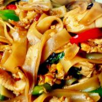 Drunken Noodles · Sautéed wide rice noodles with eggs, bell peppers, spanish onions, green onions, bamboo shoo...
