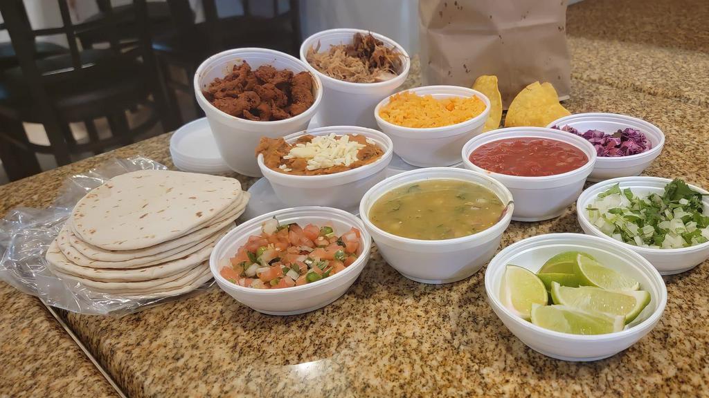  Tacos Bar Deal (4-5 People) · Up to two meats,  two 8 ounce sides of your choice, one, two 8 ounce salsas of your choice, three 5 oz garnishes, bag of chips and 12 corn or flour tortillas.
