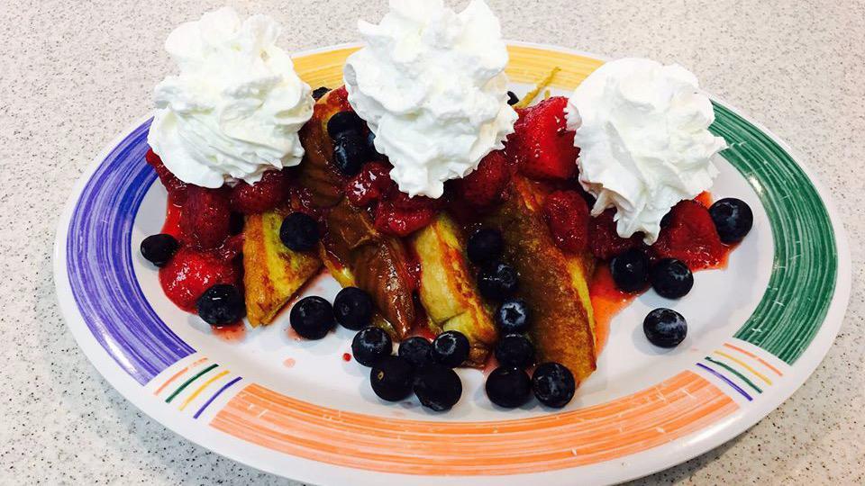 French Toast With Fruit Topping · Choice of fruit with whipped cream served on the side!